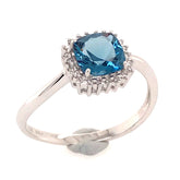 14 Karat White Gold Ring with a London Blue Topaz and Diamonds
