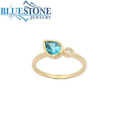 14K Yellow Gold Bezel Set Ring with Blue Topaz and One Diamond- Size 6.75