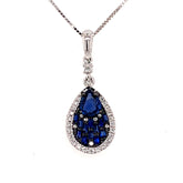 14 Karat White Gold Pendant with a Pear Cut Blue Sapphire & Emerald Cu