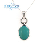 Sterling Silver Rhodium Plated Pendant with and One Oval Natural Turqu