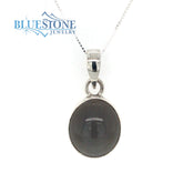 Sterling Silver Rhodium Plated Pendant Featuring One Grey Toned Oval C