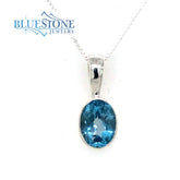 Sterling Silver Pendant w/ Blue Topaz - 18" Chain