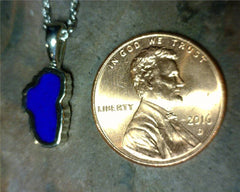 Small 14 Karat White Gold Pendant with a Lake Tahoe Shaped Lapis
MEAS