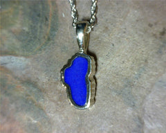 Small 14 Karat White Gold Pendant with a Lake Tahoe Shaped Lapis
MEAS