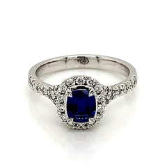 18K White Gold Ring w/ a 0.99ct Blue Sapphire & 0.40cttw of Diamonds(size 6.5)