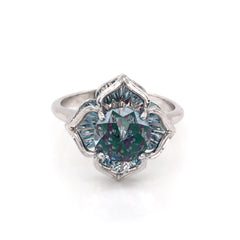 KALEIDOSCOPE 14 Karat White Gold Rig with one 6.5mm Round Blue Topaz, Emeralds & Rubies
