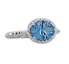 14 Karat White Gold Blue Topaz and Diamond Ring