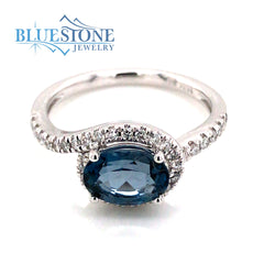 14 Karat White Gold Ring with One 1.43 Carat Oval London Blue Topaz an