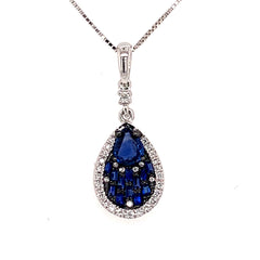 14 Karat White Gold Pendant with a Pear Cut Blue Sapphire & Emerald Cu