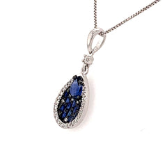14 Karat White Gold Pendant with a Pear Cut Blue Sapphire & Emerald Cu