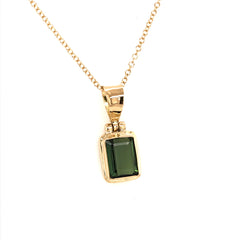 18 Karat Yellow Gold Pendant with a Rectangular Cushion Cut Green Tour