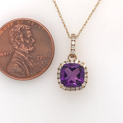 14 Karat Yellow Gold Pendant with a 1.45 Carat Cushion Cut Amethyst an