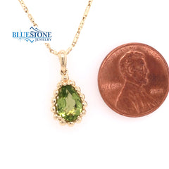 14 Karat White Gold Pendant with 1.30 Carat Peridot Cut Peridot.
Chai