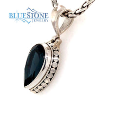 Sterling Silver Pendant with a Pear Cut London Blue Topaz Gemstone. Pe
