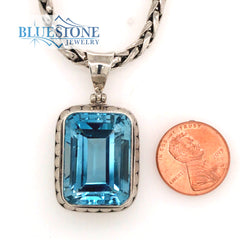Sterling Silver Dot Pendant with One Extra Large Emerald Cut Blue Topa