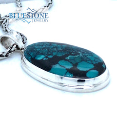 Sterling Silver Pendant with a Large Natural Turquoise on a Petite Wei