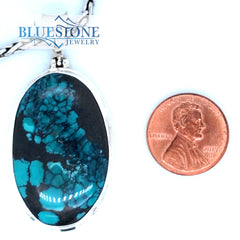 Sterling Silver Pendant with a Large Natural Turquoise on a Petite Wei