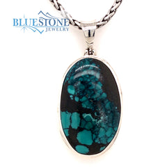 Sterling Silver Pendant with a Large Natural Turquoise on a Petite Wei