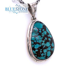 Sterling Silver Pendant with a Large Natural Turquoise on a Petite Wei