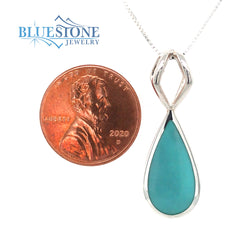 Sterling Silver Rhodium Plated Pendant with One Pear Cut Natural Turqu