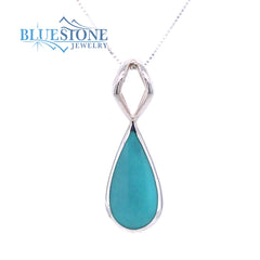 Sterling Silver Rhodium Plated Pendant with One Pear Cut Natural Turqu