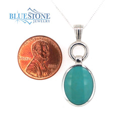 Sterling Silver Rhodium Plated Pendant with and One Oval Natural Turqu