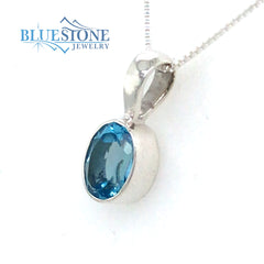 Sterling Silver Pendant w/ Blue Topaz - 18" Chain