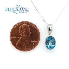 Sterling Silver Pendant w/ Blue Topaz - 18" Chain