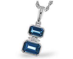 14 Karat White Gold Pendant With Two Bezel Set London Blue Topaz Gemst