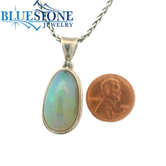 Large 18KYG Pendant w/ Cabochon Oval Cut Ethiopian Opal
