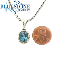 Small Sterling Silver Pendant With One Oval Cut London Blue Topaz Gems