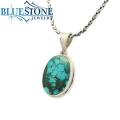 Sterling Silver Pendant with a Large Natural Turquoise on a Petite Wei