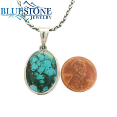 Sterling Silver Pendant with a Large Natural Turquoise on a Petite Wei