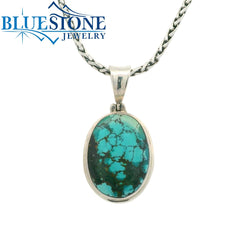 Sterling Silver Pendant with a Large Natural Turquoise on a Petite Wei
