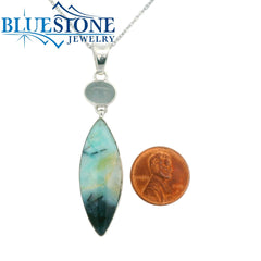 Sterling Silver Rhodium Plated Pendant with One Marquise Cut Petrified