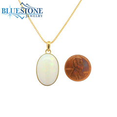 Large 18KYG Pendant w/ Cabochon Oval Cut Ethiopian Opal