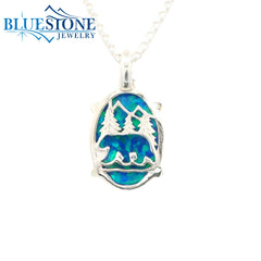 Small Silver Lake Tahoe Reversable Bear Pendant with Lab Grown Opal and Emerald.