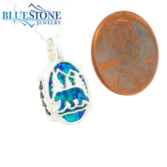 Small Silver Lake Tahoe Reversable Bear Pendant with Lab Grown Opal and Emerald.