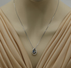 Sterling Silver Rhodium Plated Pendant with One 7mm x 5mm Pear Cut Lon