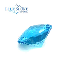 One Loose 11mm x 6.7mm Round Pinwheel Cut 4.84 Carat Swiss Blue Topaz.