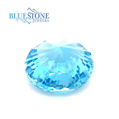One Loose 11mm x 6.7mm Round Pinwheel Cut 4.84 Carat Swiss Blue Topaz.