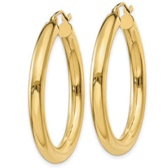 14 Karat Yellow Gold 4mm Tube Hoop Classic Earring. 35mm in length