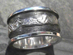 Argentium Silver Hand-Carved Lake Tahoe Mountain Ring.
Ring size 11