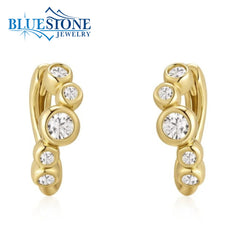 14 Karat Yellow Gold Plated Wave Hoops w/ 10 CZ Gemstones.