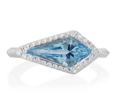 14 Karat White Gold Swiss Blue Topaz and Diamond Ring