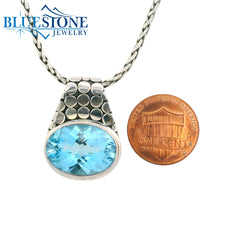 Medium Sterling Silver Armadillo Pendant with One Oval Blue Topaz on a