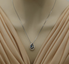 Sterling Silver Rhodium Plated Pendant with One 7mm x 5mm Pear Cut Swi