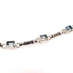 Sterling Silver Bracelet with Blue Topazes- 7 Inches