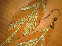 Maya Aztec Leather Feather Earrings with teal, gold and silver design