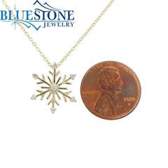 14 Karat Yellow Gold Snowflake Pendant with 7 Round Diamonds at 0.10 C